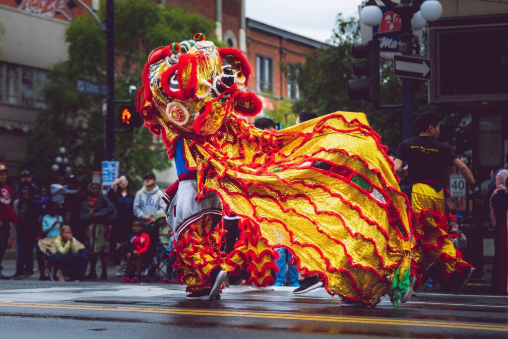 person wearing foo dog costume