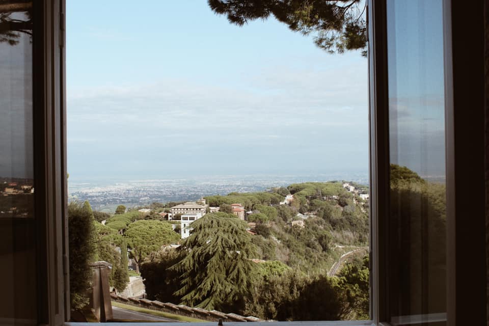 Au pair smiling outdoors during her time abroad